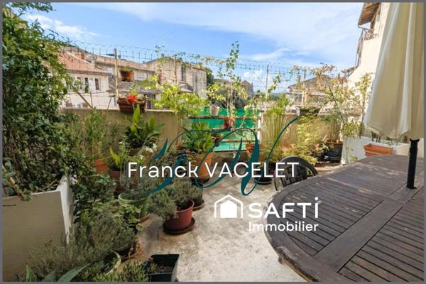 Grande demeure de caractère avec local commercial dans le centre historique