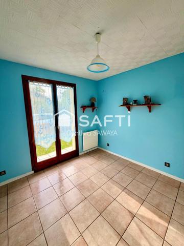 Belle maison à rafraîchir avec garage, terrasse couverte et cabanon