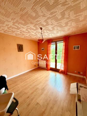 Belle maison à rafraîchir avec garage, terrasse couverte et cabanon