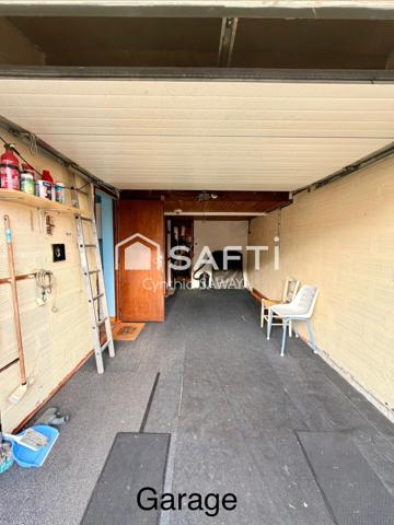 Belle maison à rafraîchir avec garage, terrasse couverte et cabanon