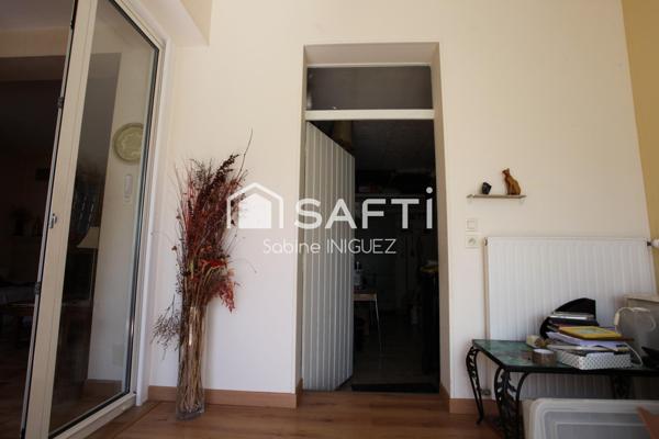 MAISON DE VILLE AVEC GARAGE ET JARDIN