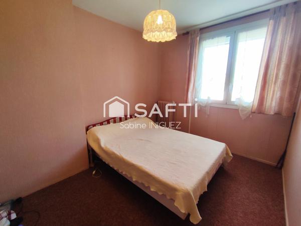 MAISON DE VILLE AVEC GARAGE ET JARDIN