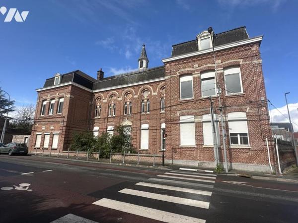  Immeuble à réhabiliter et diviser (permis obtenu) pour création de 17 logements 12 T3 et 5 T2