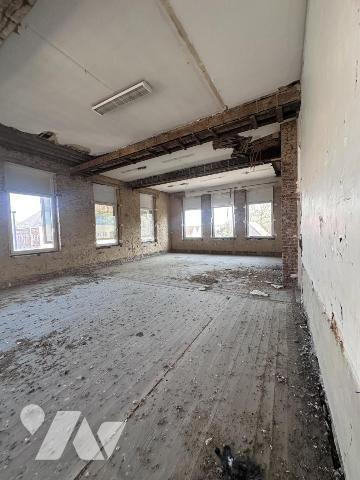  Immeuble à réhabiliter et diviser (permis obtenu) pour création de 17 logements 12 T3 et 5 T2