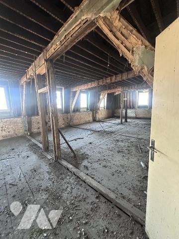  Immeuble à réhabiliter et diviser (permis obtenu) pour création de 17 logements 12 T3 et 5 T2