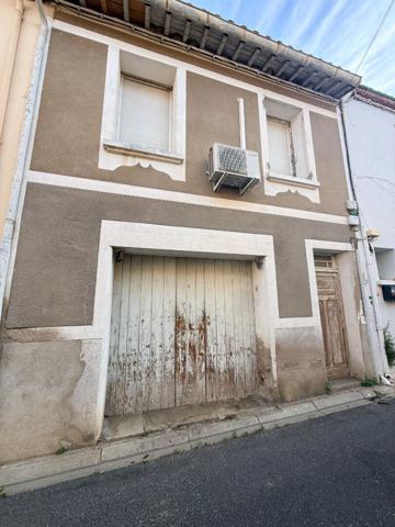 Maison de village 2 faces, avec garage en rdc sans extérieur de 58 m².