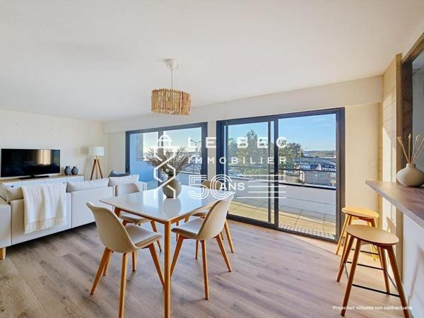 EXCLUSIVITÉ LOCMIQUÉLIC : Appartement avec vue au Port de Sainte Catherine