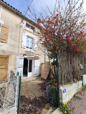 MAISON DE VILLE AVEC JARDIN ET GARAGE