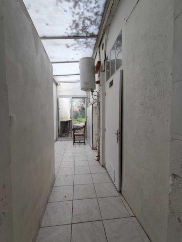 MAISON DE VILLE AVEC JARDIN ET GARAGE