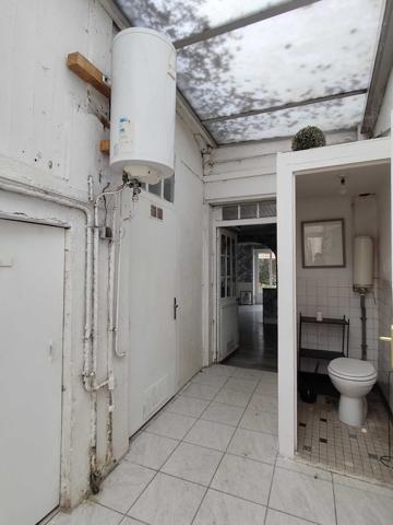 MAISON DE VILLE AVEC JARDIN ET GARAGE