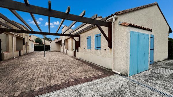 Maison 2 pièce(s) jardin parking résidence centre-ville La Palmyre proche plage, commerces et activités