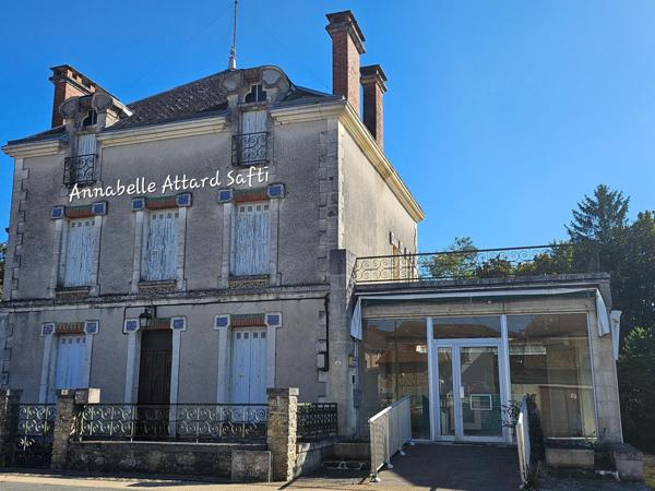 Ensemble d'une ancienne maison bourgeoise des années 1900  et d'un local commercial  à restaurer