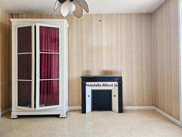 Ensemble d'une ancienne maison bourgeoise des années 1900  et d'un local commercial  à restaurer