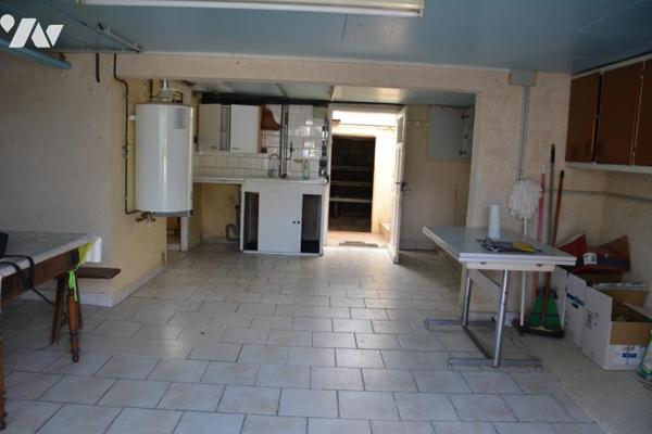 Vente sur le commune de Château-Gontier-Sur-Mayenne une maison avec jardin et garage 