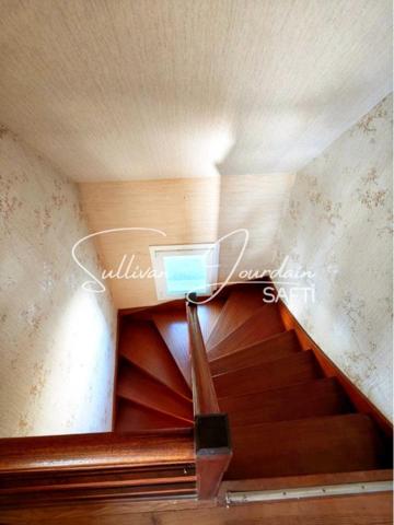 Maison à rénover proche des commodités.