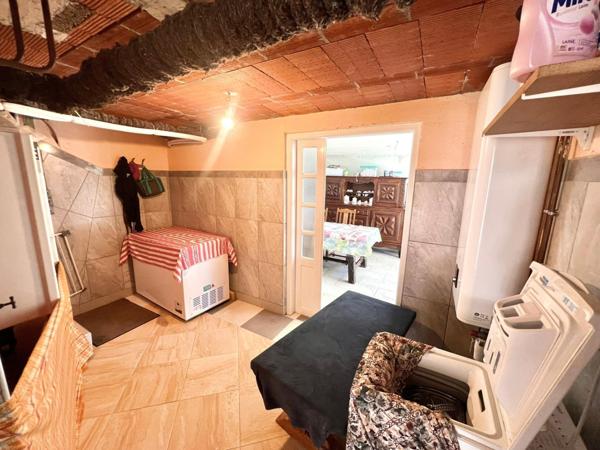 MAISON AVEC JARDIN ET GARAGE PROCHE CENTRE VILLE