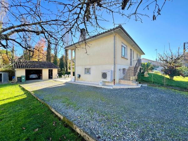 MAISON AVEC JARDIN ET GARAGE PROCHE CENTRE VILLE