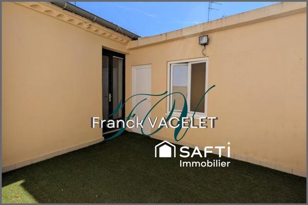 Maison en pierre rénovée avec terrasse au cœur de ville