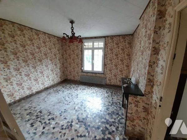 Faites revivre cette maison individuelle située dans un quartier calme.