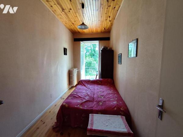 Maison avec garage, grange de 115 m², atelier et jardin en bord de bras de Meuse