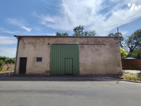 Maison avec garage, grange de 115 m², atelier et jardin en bord de bras de Meuse