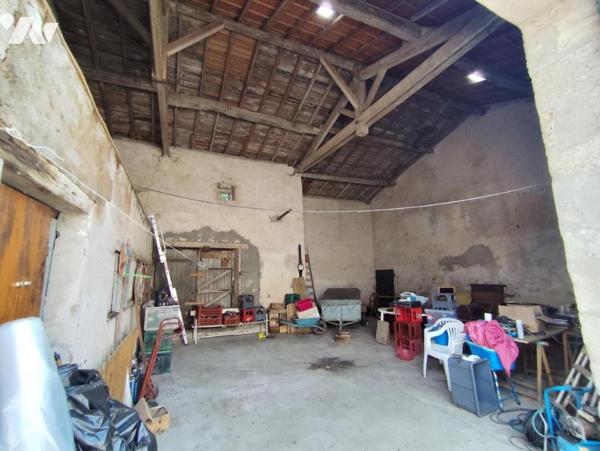 Maison avec garage, grange de 115 m², atelier et jardin en bord de bras de Meuse