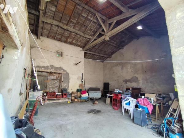 Maison avec garage, grange de 115 m², atelier et jardin en bord de bras de Meuse