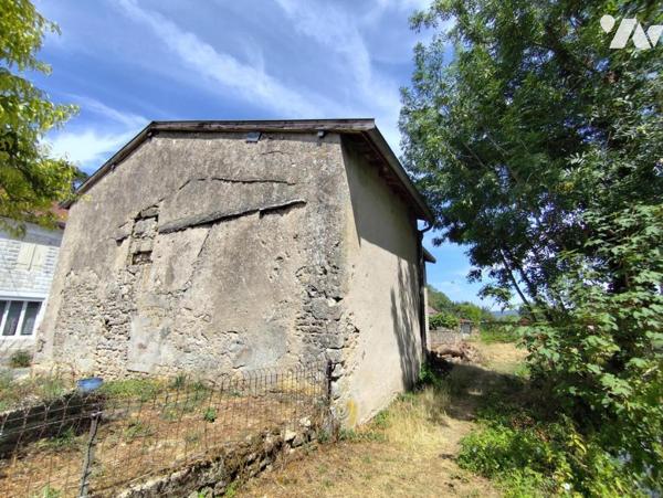 Maison avec garage, grange de 115 m², atelier et jardin en bord de bras de Meuse