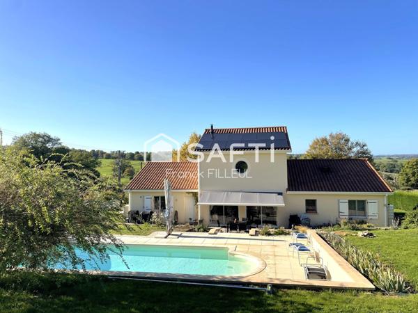 Maison moderne, économe, piscine et double garage