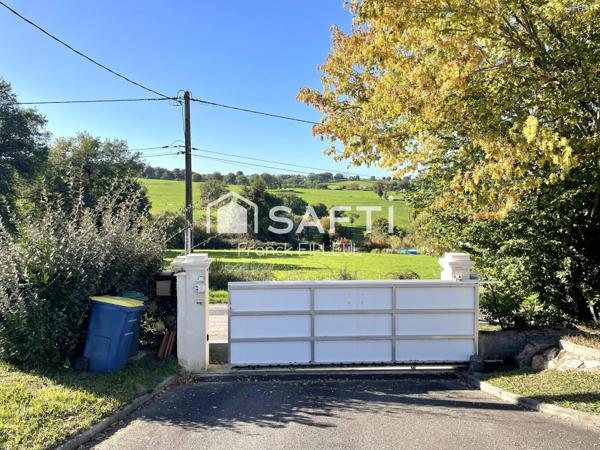 Maison moderne, économe, piscine et double garage