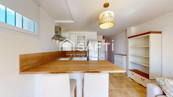 Appartement T2, en rez-de-jardin, deux places de stationnement privative
