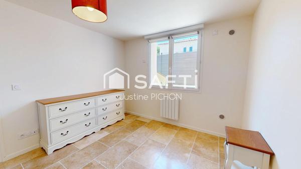 Appartement T2, en rez-de-jardin, deux places de stationnement privative