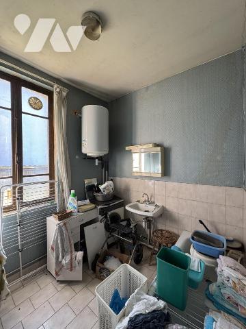 Maison à rénover avec grande parcelle de jardin