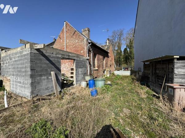 Maison à rénover avec grande parcelle de jardin