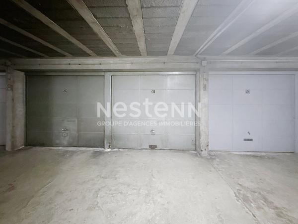 Garage box en sous sol  dans copropriété fermée en face du tramway - 69500 BRON
