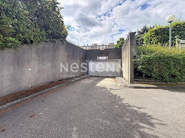 Garage box en sous sol  dans copropriété fermée en face du tramway - 69500 BRON