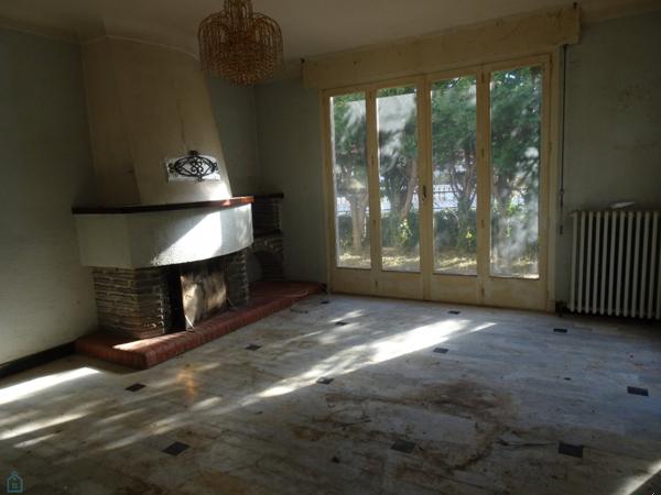 Maison 6 pièces avec garage et jardin à rénover