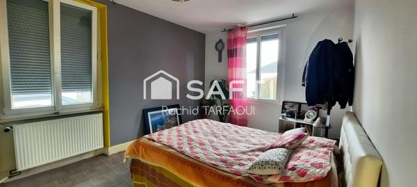 Maison sur trois niveaux dans une ruelle calme, proche de Pfastatt