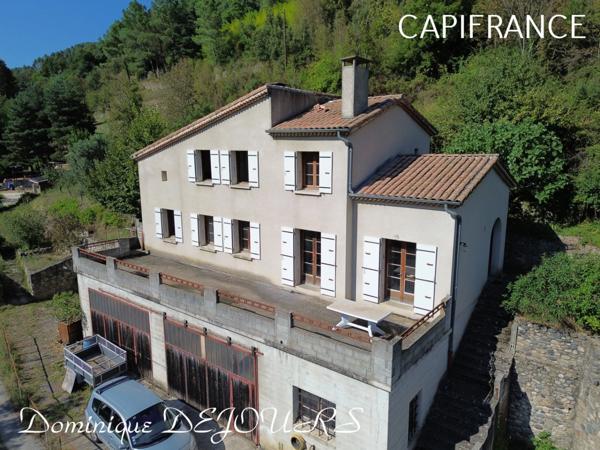 Grande Maison de 136m² habitable avec un garage en rez-de-chaussée d'environ 150m² proche de SAINT SAUVEUR DE MONTAGUT et surplombant la Dolce Via.