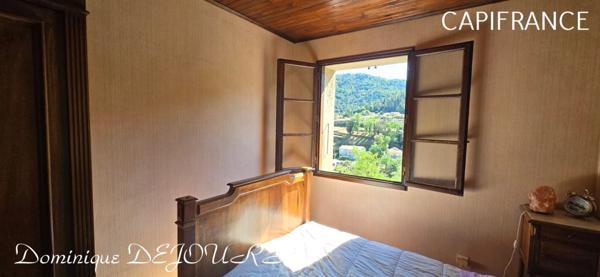 Grande Maison de 136m² habitable avec un garage en rez-de-chaussée d'environ 150m² proche de SAINT SAUVEUR DE MONTAGUT et surplombant la Dolce Via.