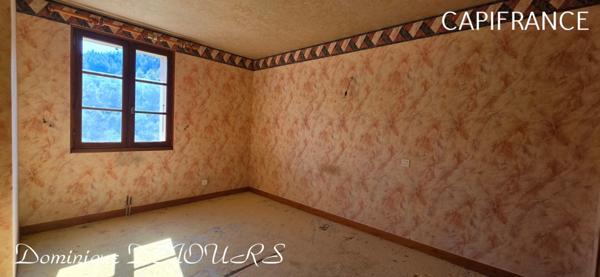 Grande Maison de 136m² habitable avec un garage en rez-de-chaussée d'environ 150m² proche de SAINT SAUVEUR DE MONTAGUT et surplombant la Dolce Via.