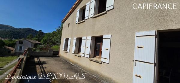 Grande Maison de 136m² habitable avec un garage en rez-de-chaussée d'environ 150m² proche de SAINT SAUVEUR DE MONTAGUT et surplombant la Dolce Via.