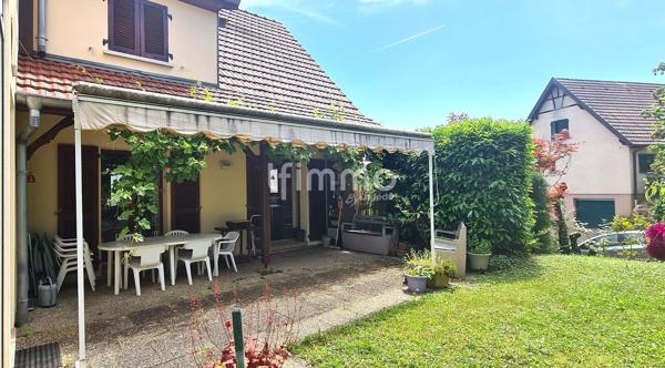 Maison jumelée 5 pièces de 120 m² sous-sol complet et jardin