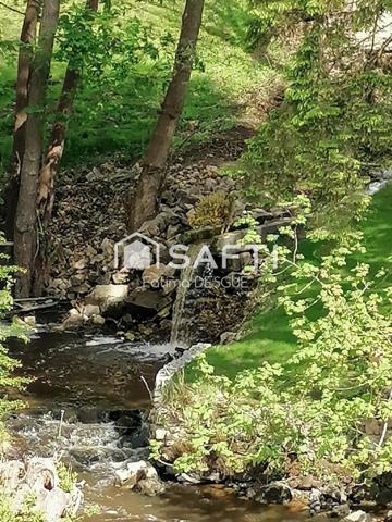 ? Maison atypique 130 m² – Terrain avec rivière – Mortain (50)