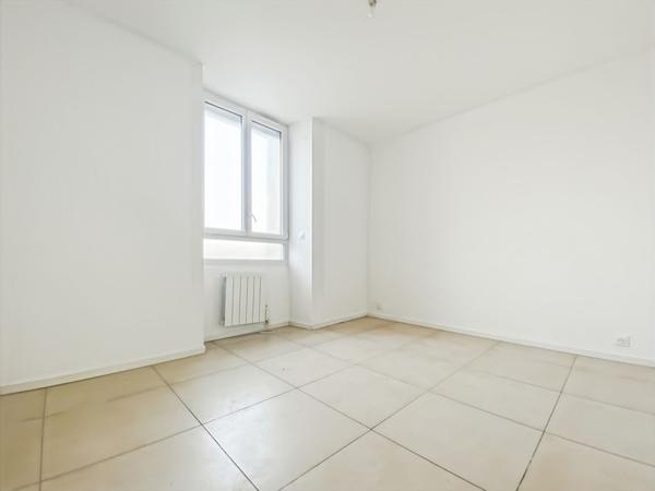 Appartement F2 de 41.36m² avec jardin et garage privatifs
