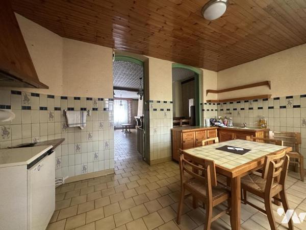 Centre-ville de La Bassée, maison d'environ 110m² avec jardin et garage