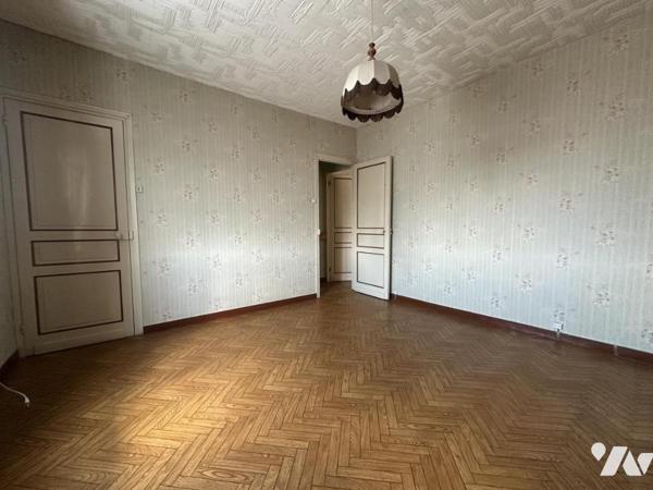 Centre-ville de La Bassée, maison d'environ 110m² avec jardin et garage