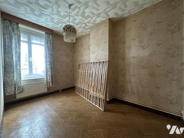 Centre-ville de La Bassée, maison d'environ 110m² avec jardin et garage