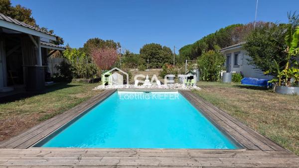 ENSEMBLE IMMOBILIER AVEC TERRAIN DE 10 700 M2