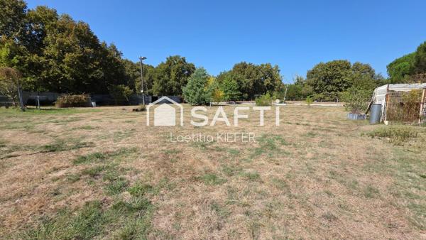 ENSEMBLE IMMOBILIER AVEC TERRAIN DE 10 700 M2